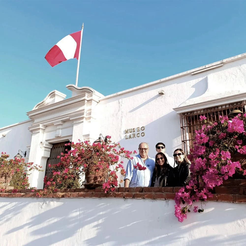Larco Museum entrance with bougainvillea flowers in Lima
