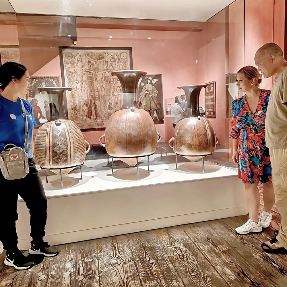 Visitors viewing pre-Columbian ceramics at the Larco Museum in Lima