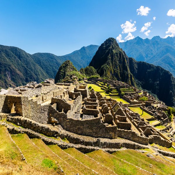 Panoramic view of Machu Picchu on a beautiful sunny day, The Valley of the Incas, Cuzco, Peru. Famous and tourist place in South America